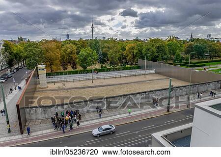Replica border fortification, Berlin Wall Memorial, Bernauer Straße, Mitte, Berlin, Germany, Europe View Large Photo Image Stock Image - Replica border fortification, Berlin Wall Memorial, Bernauer Straße, Mitte, Berlin, Germany, Europe. Fotosearch