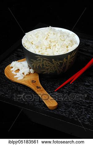 Rice bowl with chopsticks, rice grain, rice grains View Large Photo Image Stock Image - Rice bowl with chopsticks, rice grain, rice grains. Fotosearch