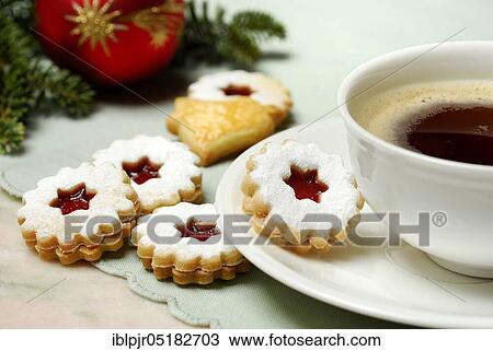 Stock Image - Rogue pastry and coffee cup, cookies, biscuits, cookies, Christmas cookies. Fotosearch