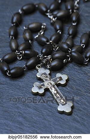 Stock Photograph - Rosary, crucifix, cross, Jesus cross, rosary chain. Fotosearch