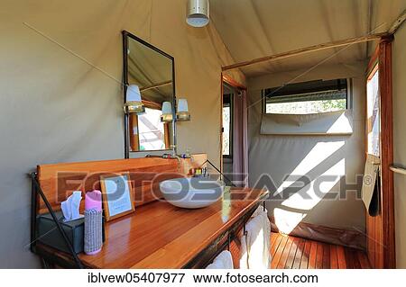Stock Photo - Safari tent, bathroom, washroom, lodge, hotel, safari, Okavango Delta, Botswana, Africa. Fotosearch