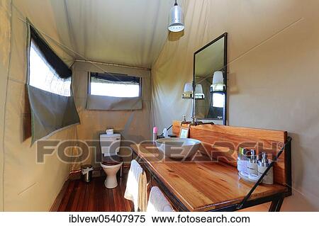 Safari tent, bathroom, washroom, lodge, hotel, safari, Okavango Delta, Botswana, Africa View Large Photo Image Stock Photography - Safari tent, bathroom, washroom, lodge, hotel, safari, Okavango Delta, Botswana, Africa. Fotosearch