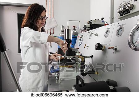 Scientist at the high-pressure machine for simulating conditions deep in the earth for research on the origin of life, Faculty of Biology, Department of Geology, Laboratory at the University of Duisburg-Essen, Essen, Germany, Europe View Large Photo Image Stock Photography - Scientist at the high-pressure machine for simulating conditions deep in the earth for research on the origin of life, Faculty of Biology, Department of Geology, Laboratory at the University of Duisburg-Essen, Essen, Germany, Europe. Fotosearch