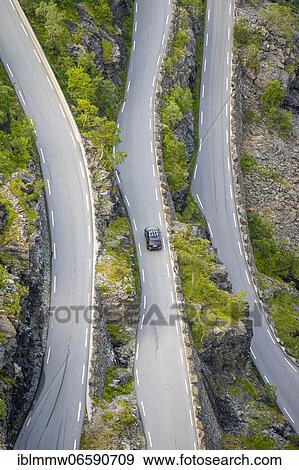 Stock Photo - Single car, mountain road Trollstigen, near Åndalsnes, Møre og Romsdal, Vestland, Norway, Europe. Fotosearch