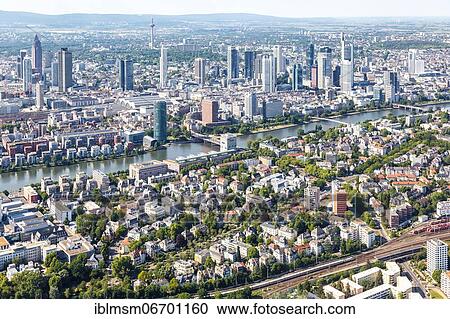 Stock Image - Skyline aerial view river Main railway trains ICE skyscrapers city, Frankfurt, Germany, Europe. Fotosearch