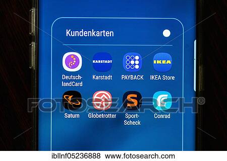 Stock Photo - Smartphone, customer cards. Fotosearch