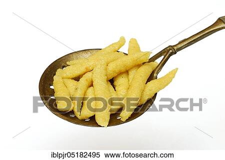 Stock Photography - Spätzle in skimmer, spaetzle, noodles. Fotosearch