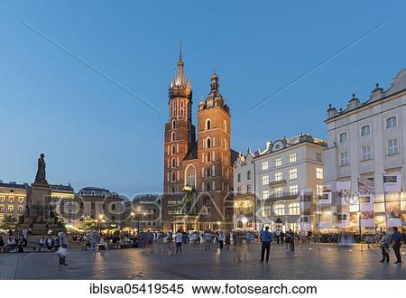 St. Mary's Basilica (Kosciol Mariacki) and Main Market Square (Rynek Glowny) in Krakow, Poland, Europe View Large Photo Image Stock Photography - St. Mary's Basilica (Kosciol Mariacki) and Main Market Square (Rynek Glowny) in Krakow, Poland, Europe. Fotosearch