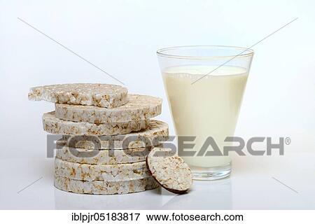 Stacked rice cakes, chocolate coated rice cakes, glass of milk, rice cake View Large Photo Image Stock Photo - Stacked rice cakes, chocolate coated rice cakes, glass of milk, rice cake. Fotosearch