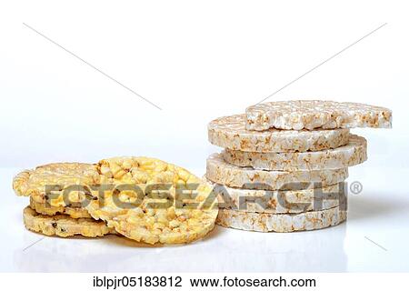 Stock Image - Stacked rice wafers, corn wafers, rice cake. Fotosearch