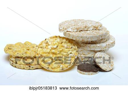 Stock Image - Stacked rice wafers, corn wafers, rice cake. Fotosearch