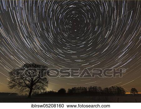 Stock Image - Star trails, Lower Saxony, Germany, Europe. Fotosearch