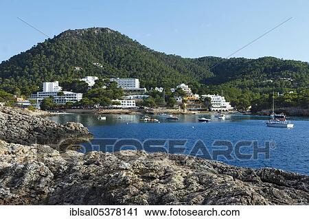 Stock Image - Stone shores on the coast of Portinatx, Ibiza, Balearic Islands, Spain, Europe. Fotosearch