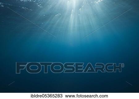 Stock Image - Sunbeams in the water, Socorro, Revillagigedo Islands, Mexico, Central America. Fotosearch