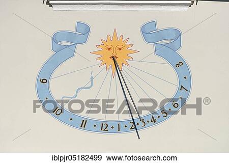 Stock Photo - Sundial on house wall, Arlesheim, Canton Baselland, Switzerland, Europe. Fotosearch