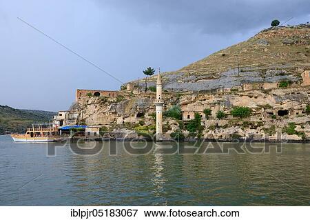 Stock Photo - Sunken village in the Euphrates, Mesopotamia, Sanliurfa Province, South East Anatolia Project ( flooding of the area), old village name Belesur, new name Savasan, Halfeti, Turkey, Asia. Fotosearch