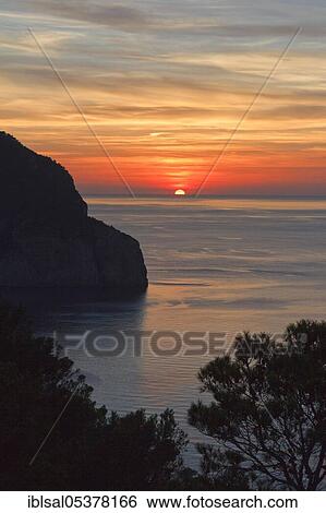 Stock Photograph - Sunset in Na Xamena, Ibiza, Spain, Europe. Fotosearch