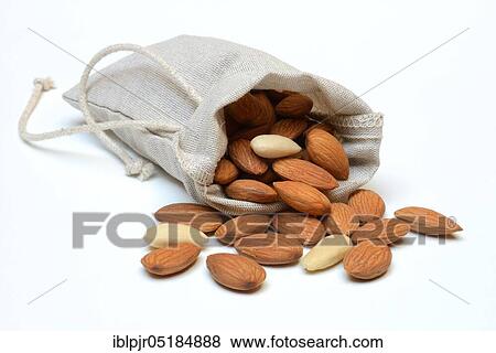 Stock Photo - Sweet almonds in linen bags ( Prunus dulcis). Fotosearch