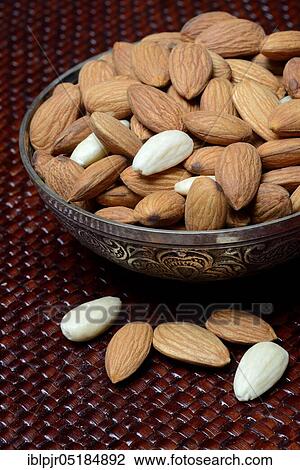 Sweet almonds in shell ( Prunus dulcis) View Large Photo Image Stock Image - Sweet almonds in shell ( Prunus dulcis). Fotosearch