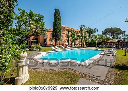 Swimming pool of the Catania Hotel, San Giovanni la Punta, Southern Italy, Sicily, Italy, Europe View Large Photo Image Stock Photo - Swimming pool of the Catania Hotel, San Giovanni la Punta, Southern Italy, Sicily, Italy, Europe. Fotosearch