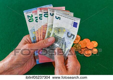 Symbol photo, pension, senior, hands, money View Large Photo Image Picture - Symbol photo, pension, senior, hands, money. Fotosearch