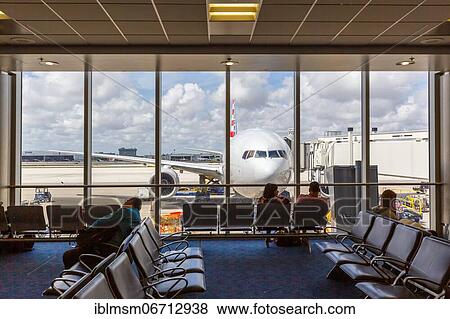 Symbolic image Aviation with an American Airlines plane at Miami Airport, USA, North America View Large Photo Image Stock Photo - Symbolic image Aviation with an American Airlines plane at Miami Airport, USA, North America. Fotosearch
