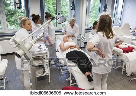 Teacher demonstrates in practical lessons. Training as a beautician at the vocational school, Düsseldorf, North Rhine-Westphalia, Germany, Europe View Large Photo Image Stock Photography - Teacher demonstrates in practical lessons. Training as a beautician at the vocational school, Düsseldorf, North Rhine-Westphalia, Germany, Europe. Fotosearch