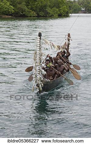 Telina Island locals greet visitors, Marovo Lagoon, Solomon Islands, Oceania View Large Photo Image Stock Photo - Telina Island locals greet visitors, Marovo Lagoon, Solomon Islands, Oceania. Fotosearch