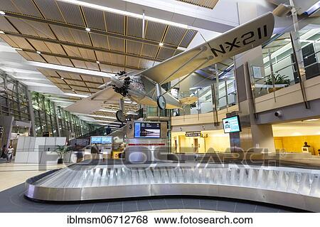Stock Photo - Terminal 2 of San Diego International Airport (SAN) in the United States with a replica of the Spirit of St, Louis in San Diego, U. S. Fotosearch