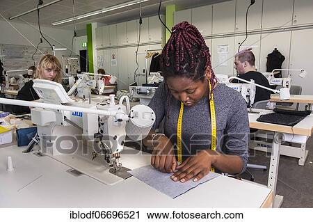 Stock Image - Textile class, training as a tailor, Elly-Heuss-Knapp-Schule, Berufskolleg der Stadt Düsseldorf, North Rhine-Westphalia, Germany, Europe. Fotosearch