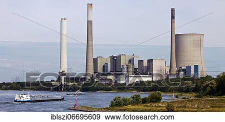 The decommissioned Voerde power station on the Rhine with its 250-metre-high smokestack, Dinslaken, Ruhr Area, North Rhine-Westphalia, Germany, Europe View Large Photo Image Stock Photo - The decommissioned Voerde power station on the Rhine with its 250-metre-high smokestack, Dinslaken, Ruhr Area, North Rhine-Westphalia, Germany, Europe. Fotosearch