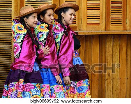Three young indigenous girls pose in colorful costumes, Kuelap, Luya Province, Amazonas Region, Peru, South America View Large Photo Image Stock Image - Three young indigenous girls pose in colorful costumes, Kuelap, Luya Province, Amazonas Region, Peru, South America. Fotosearch