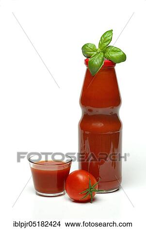 Picture - Tomato juice, bottle and glass, tomato, basil. Fotosearch