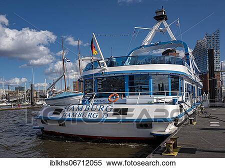 Touring ship in the port of Hamburg, Hamburg, Germany, Europe View Large Photo Image Stock Photography - Touring ship in the port of Hamburg, Hamburg, Germany, Europe. Fotosearch