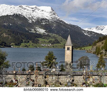 Stock Image - Tower of the parish church of St. Catherine in the Reschensee, reservoir, Alt-Graun, Vinschgau, South Tyrol, Italy, Europe. Fotosearch