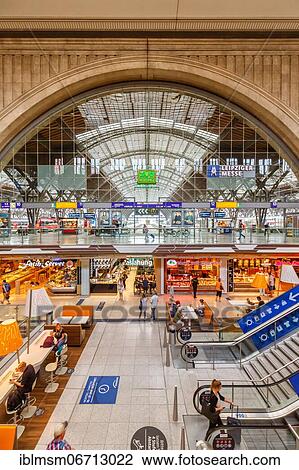 Stock Image - Train Station Hbf Deutsche Bahn DB Halle Shops Stores in Leipzig, Germany, Europe. Fotosearch
