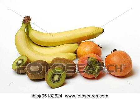 Tropical fruit, banana, kiwi, persimmon, Chinese gooseberry View Large Photo Image Picture - Tropical fruit, banana, kiwi, persimmon, Chinese gooseberry. Fotosearch