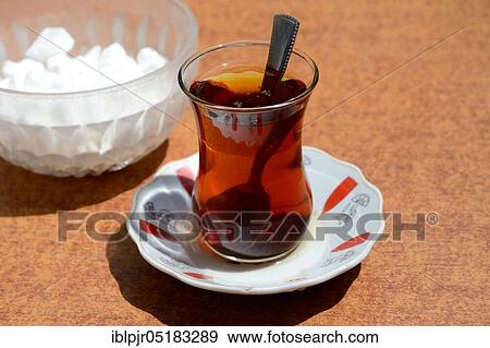 Turkish tea glass with tea, Turkey, Asia View Large Photo Image Stock Photo - Turkish tea glass with tea, Turkey, Asia. Fotosearch