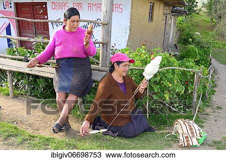 Two indigenous woman spinning wool, Karajia, Luya province, Amazonas region, Peru, South America View Large Photo Image Stock Image - Two indigenous woman spinning wool, Karajia, Luya province, Amazonas region, Peru, South America. Fotosearch