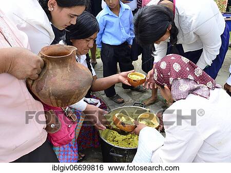 Stock Photograph - Typical food is distributed at a folk festival, Kuelap, Luya Province, Amazonas Region, Peru, South America. Fotosearch