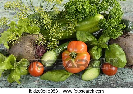 Various vegetables, cucumber, tomatoes (Solanum lycopersicum), basil (Ocimum basilicum), parsley (Petroselinum crispum), dill (Anethum graveolens), beetroot (Beta vulgaris), snake cucumber (Cucumis sativus), cucumber, tomato View Large Photo Image Stock Image - Various vegetables, cucumber, tomatoes (Solanum lycopersicum), basil (Ocimum basilicum), parsley (Petroselinum crispum), dill (Anethum graveolens), beetroot (Beta vulgaris), snake cucumber (Cucumis sativus), cucumber, tomato. Fotosearch