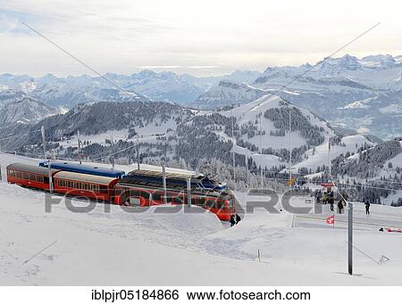 View from Rigi-Kulm on rack railways and Swiss Alps, Central Switzerland, Canton Zug, Switzerland, Europe View Large Photo Image Stock Photograph - View from Rigi-Kulm on rack railways and Swiss Alps, Central Switzerland, Canton Zug, Switzerland, Europe. Fotosearch