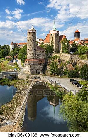 View over the river Spree to the historical old town with Burgwasserturm, Alte Wasserkunst, city wall, Michaeliskirche, and water tower, Bautzen, Oberlausitz, Saxony, Germany, Europe View Large Photo Image Stock Photograph - View over the river Spree to the historical old town with Burgwasserturm, Alte Wasserkunst, city wall, Michaeliskirche, and water tower, Bautzen, Oberlausitz, Saxony, Germany, Europe. Fotosearch
