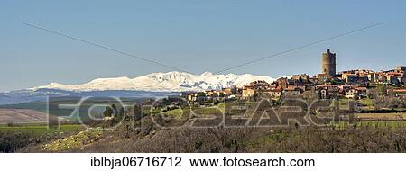 Stock Image - Village of Montpeyroux and view on Sancy massif in winter, labelled Les Plus Beaux Villages de France, Puy de Dome department, Auvergne-Rhone-Alpes, France, Europe. Fotosearch
