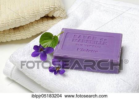 Violet soap and violet flowers on towel, soap View Large Photo Image Picture - Violet soap and violet flowers on towel, soap. Fotosearch