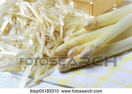 Stock Image - White, peel, Garden asparagus peel, w a s t e. Fotosearch