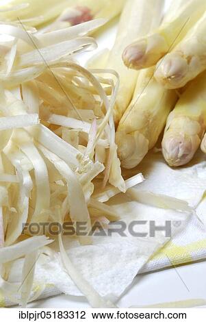 Stock Image - White, peel, Garden asparagus peel, w a s t e. Fotosearch