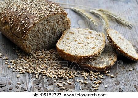 Stock Photo - Wholemeal bread, sliced, wheat grains (Triticum spec. ), bread. Fotosearch