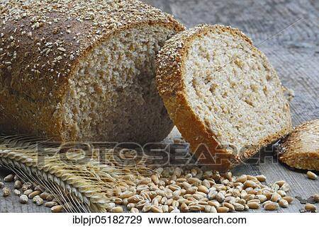 Stock Photo - Wholemeal bread, sliced, wheat grains (Triticum spec. ), bread. Fotosearch