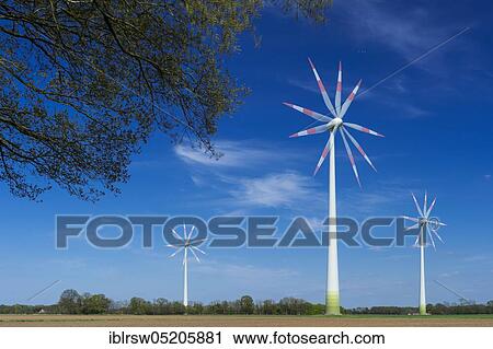 Stock Image - Wind power plant, wind turbines, Carum, Lower Saxony, Germany, Europe. Fotosearch